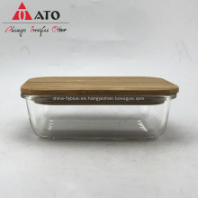 Recipiente de comida de vidrio rectangular con tapa de bambú